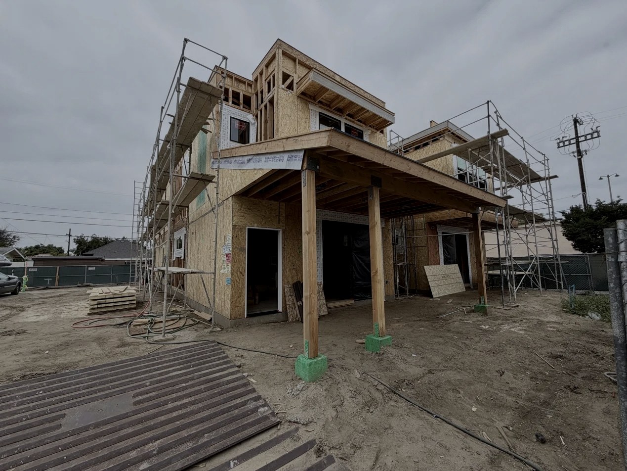 Entrada construction progress, west elevation, May 2026