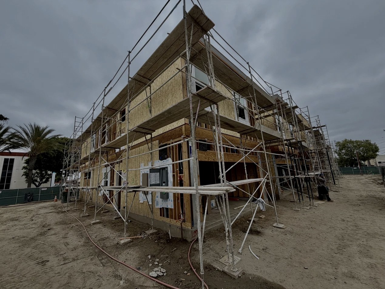 Entrada construction progress, west elevation, May 2026