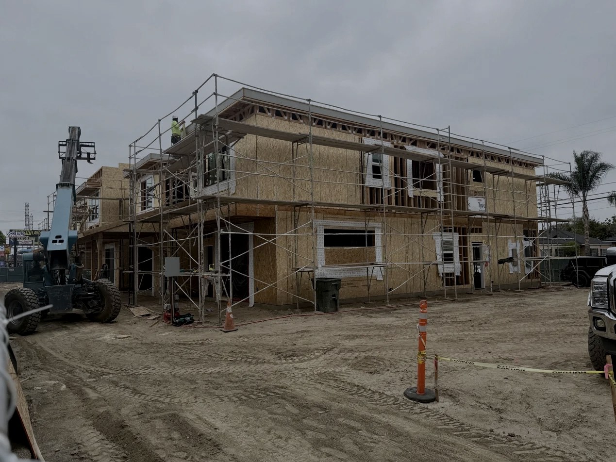Entrada construction progress, west elevation, May 2026